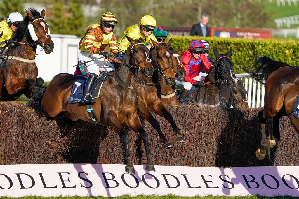 Patrick Mullins riding Billaway (centre, yellow) on their way to winning the Festival Challenge Cup Open Hunters' Chase at Cheltenham. Photograph: Alan Crowhurst/Getty Images