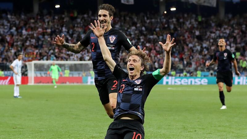 Luka Modric celebrates after scoring his team’s second goal. Photograph: Elsa/Getty Images