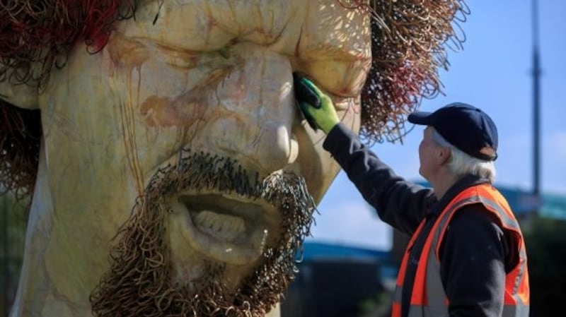 The Luke Kelly statue on Guild St, Dublin, being cleaned after being defaced in April. Photograph: Gareth Chaney/Collins
