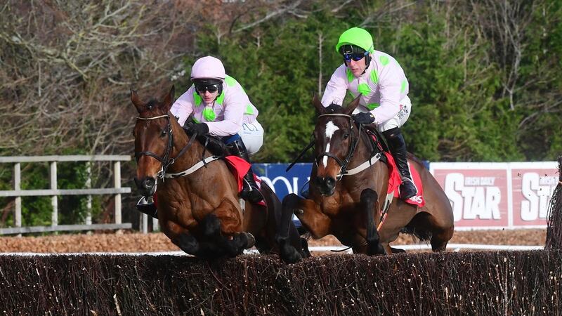Chacun Pour Soi ridden by Paul Townend (left) jumps the second last fence on the way to winning the Ladbrokes Dublin Steeplechase during on day one of the Dublin Racing Festival at Leopardstown. Photograph: PA Wire