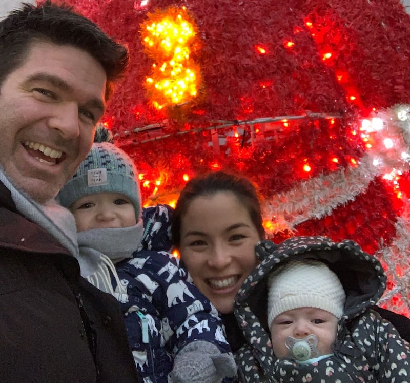 Family Christmas: Billy Holland with his wife, Lanlih, and their sons, Seán and Matthew. Photograph courtesy of the Holland family