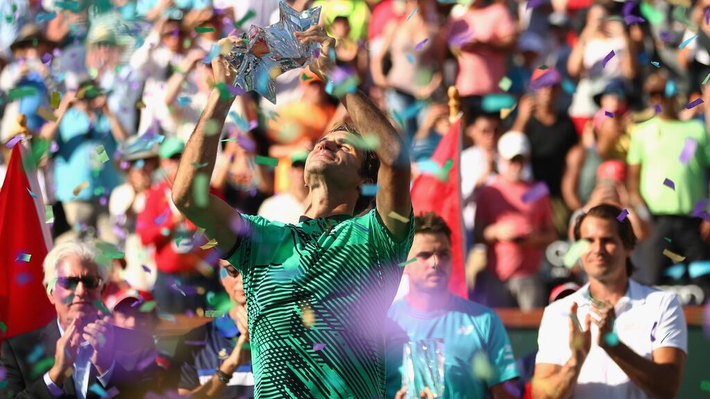 Roger Federer beat compatriot Stan Wawrinka in straight sets to secure his fifth Indian Wells title.  Photograph: Clive Brunskill/Getty