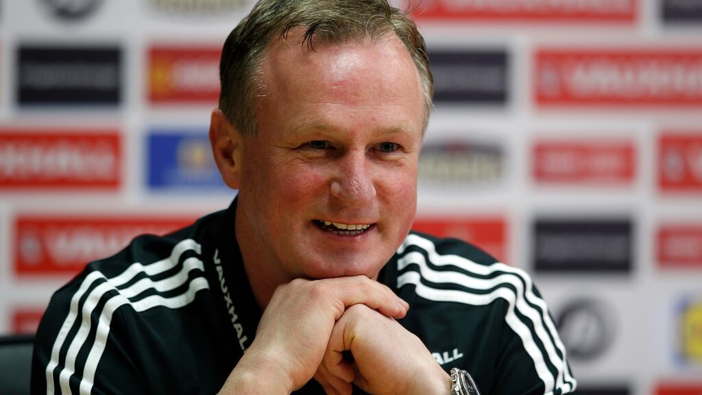 Michael O’Neill said the most important thing was that the players could adapt. Photograph: Paul Childs/Reuters