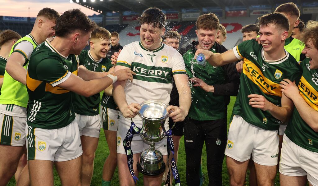 Michael Tansley, Kerry U20 captain and goalkeeper, lifts the Noel Walsh Cup with his team-mates after their win over Cork at  Pairc Ui Chaoimh. Photograph: James Crombie/Inpho