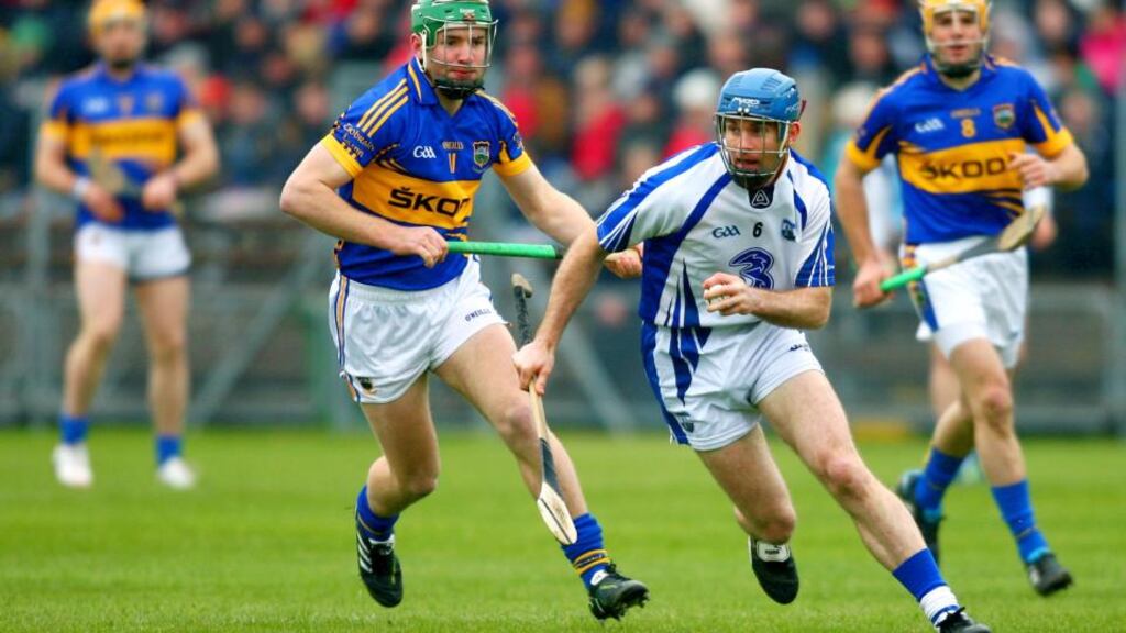 Waterford's Michael Walsh get s away from Tipperary’s Noel McGrath during the Allianz Hurling League Division 1A match at Walsh Park. Photograph: Ken Sutton/Inpho