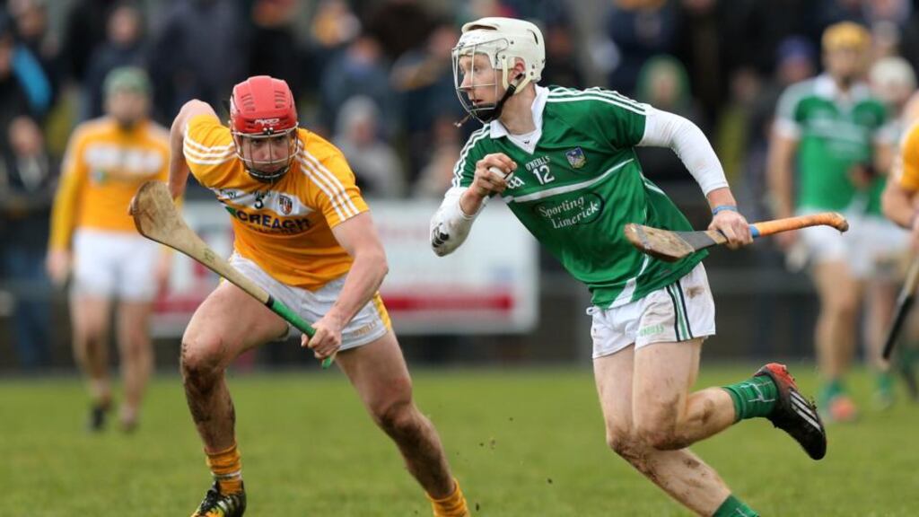 Limerick’s Cian Lynch and Antrim’s Simon McCrory compete in their Allianz Hurling League Division 1B clash in  Ballycastle, which Limerick went on to win. Photograph: John McIlwaine/Presseye/Inpho