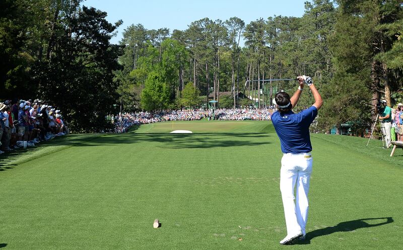 Spectators traditionally sit on the slope below the tee box at the sixth where players hit over them.