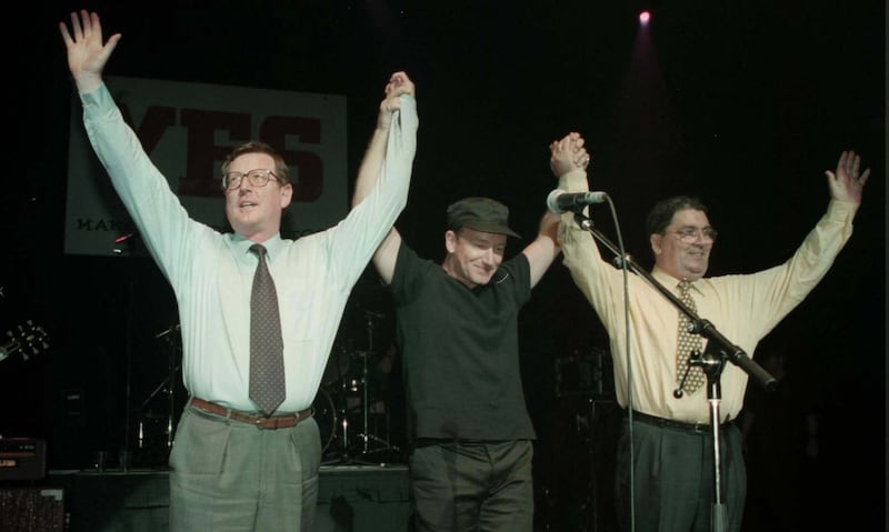 Ulster Unionist leader David Trimble, U2 singer Bono, and SDLP leader John Hume on stage for the 'Yes' concert at the Waterfront Hall in Belfast in May 1998. Photograph: Brian Little/PA