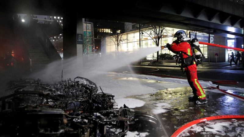 A firefighter works at the scene of a fire near Gare de Lyon railway station in Paris. Photograph: Reuters