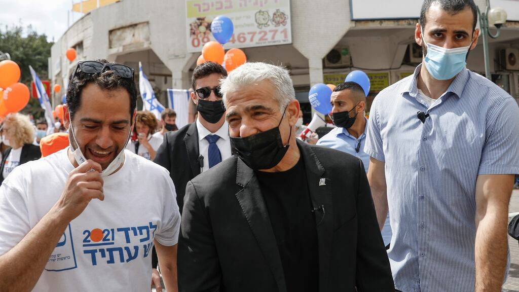 Yair Lapid: His Yesh Atid party has promised to lower the cost of living and reduce the power of religious authorities. Photograph: Atef Safadi