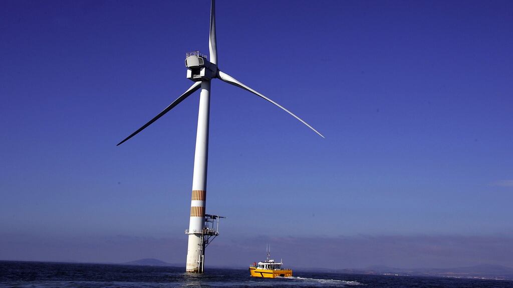 An SSE maintenance vessel approaches a turbine on the company’s Arklow bank wind farm. Photograph: David O’Brien.