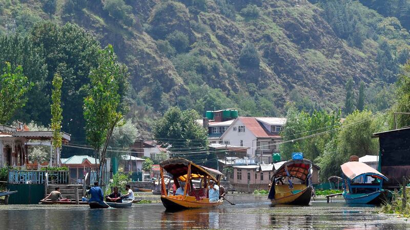 Shikara boats on Dal Lake in Srinagar. Kashmir’s tourism sector is reeling from a three-week long lockdown. Photograph: Punit Paranjpe/AFP/Getty Images