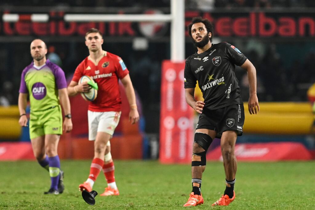 Jaden Hendrikse of the Sharks takes a kick during the shoot-out as Munster's Jack Crowley watches on. Photograph: Darren Stewart/Steve Haag Sports/Inpho