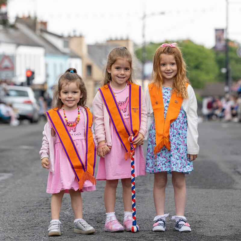 Sisters Amelia (3) and Anna Newell (5) with their cousin Faith Newell (4) from Kilkeel, Co Down, at the annual Twelfth of July celebrations on Monday. Photograph: Liam McBurney/PA Wire