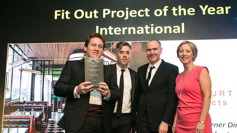 Sarah McDonnel, Principal, Unispace presents the Fit Out Project of the Year – International award to Dara Mulhern, Damien Culligan & Justin Kinsella, Harcourt Architects