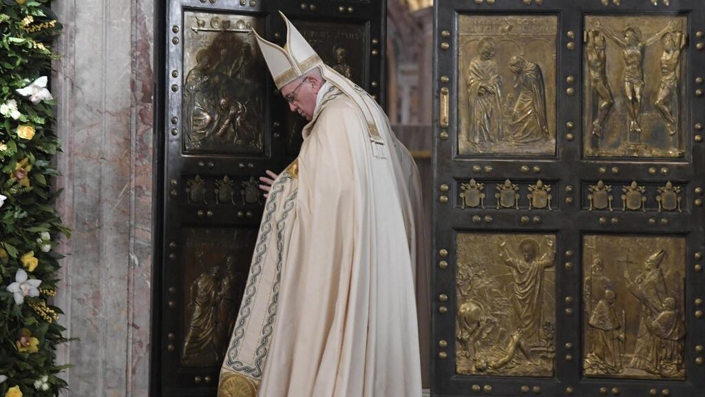Pope Francis closes the Holy Door at Saint Peter’s in Rome on Sunday to mark the end of the Holy Year of Mercy. Photograph: Tiziana Fabi/EPA