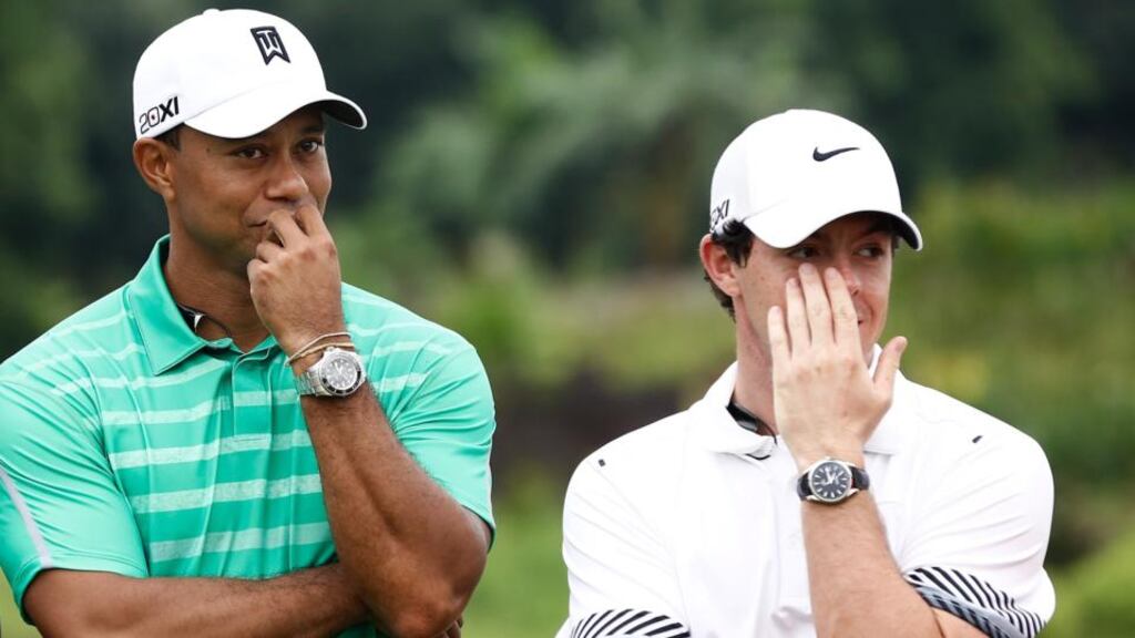Tiger Woods and  Rory McIlroy at the Blackstone Course, Mission Hills, China,  on Monday.  Photograph:  Lintao Zhang/Getty Images