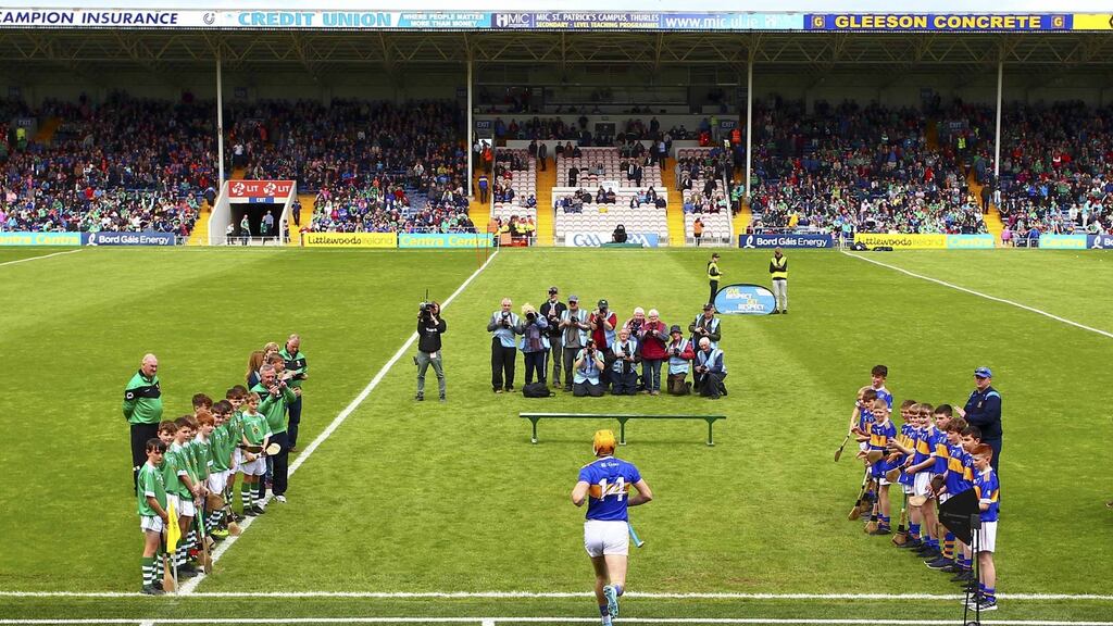 Tipperary captain Séamus Callanan leads his side on to the pitch for the clash against Limerick in Thurles. The game drew a bumper 39,115 attendance. Photograph: Ken Sutton/Inpho