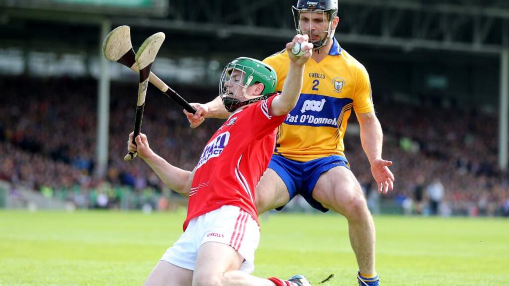 Cork’s Séamus Harnedy wins the ball ahead of Clare’s Domhnall O’Donovan during the Munster SHC semi-final at the Gaelic Grounds, Limerick. Photograph: Cathal Noonan/Inpho