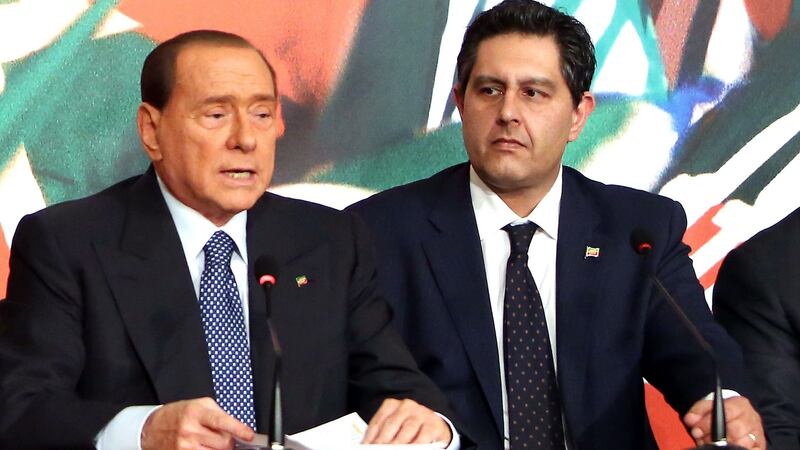 Silvio Berlusconi and his personal advisor, Giovanni Toti, attend a press conference to open the European electoral campaign of Berlusconi’s party Forza Italia on April 18th, 2014 in Rome. Photograph: Franco Origlia/ Getty