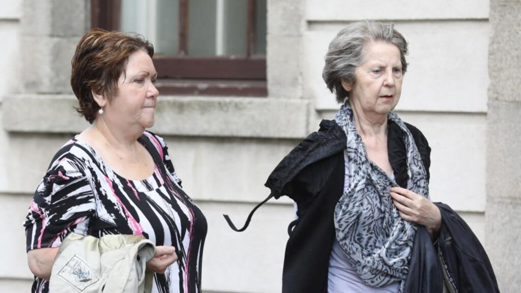 Olive and Ann Cunningham leaving the Four Courts after the opening day of a High Court action taken by their second cousin Kathleen McNicholas. Photograph: Collins Courts.