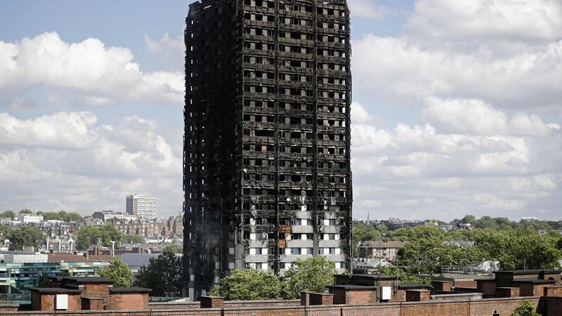 Burnt-out remains of the residential tower block Grenfell Tower a day after it was gutted by fire. Tolga Akmen/AFP/Getty