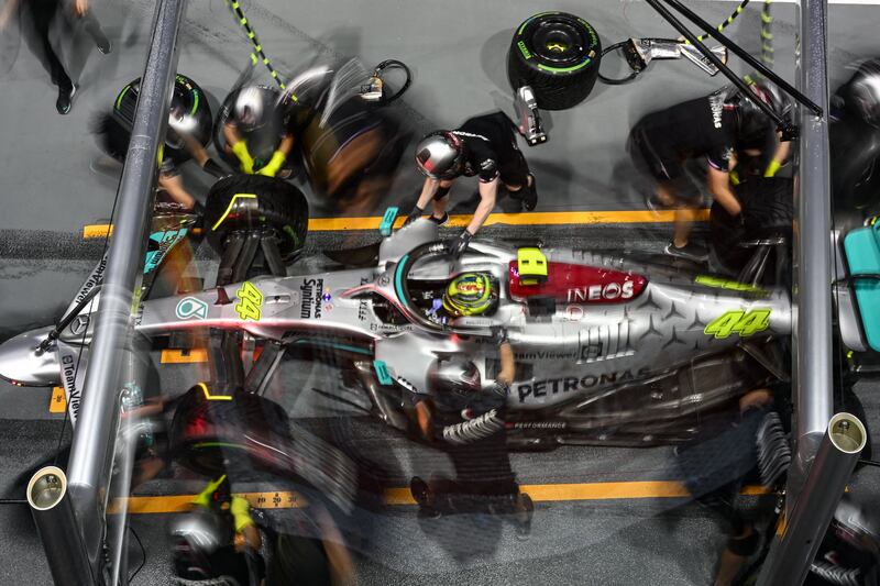Pressure zone: Lewis Hamilton and his crew in the pit lane in Singapore. Photograph: Mohd Rasfan/AFP via Getty