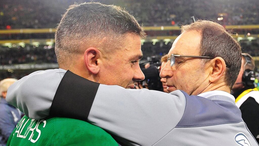 Ireland manager Martin O’Neill  celebrates with two-goal hero Jon Walters.   Photograph: Aidan Crawley/EPA