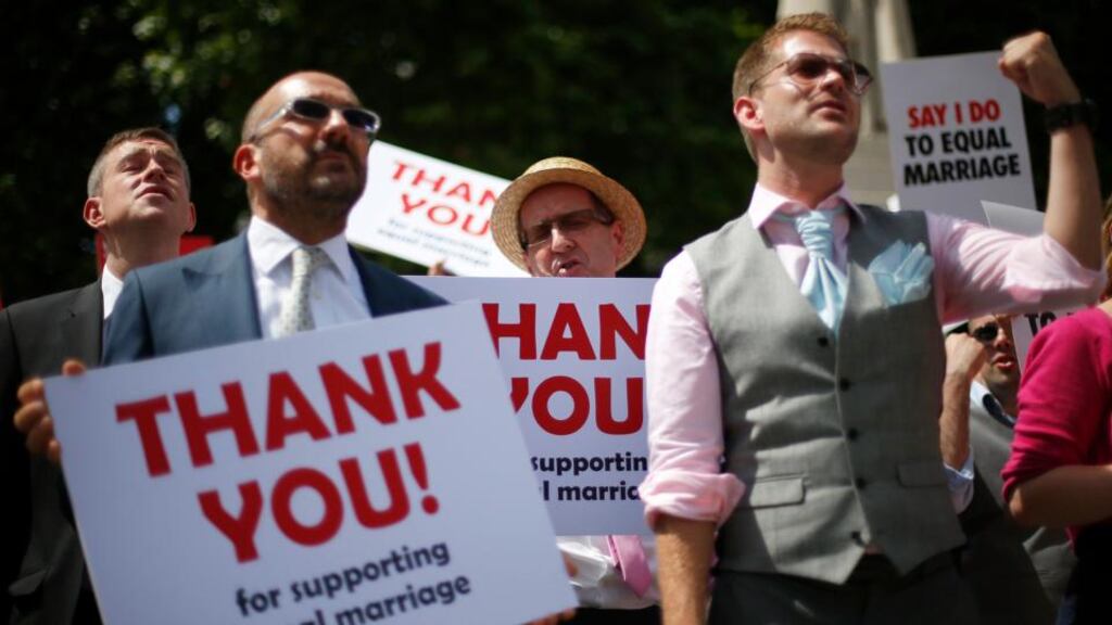 Members of the London Gay Men’s Choir perform in front of the Houses of Parliament in London in a vigil timed to coincide with the Marriage (Same Sex Couples) Bill being read in the House of Lords. Photograph: Reuters/Andrew Winning