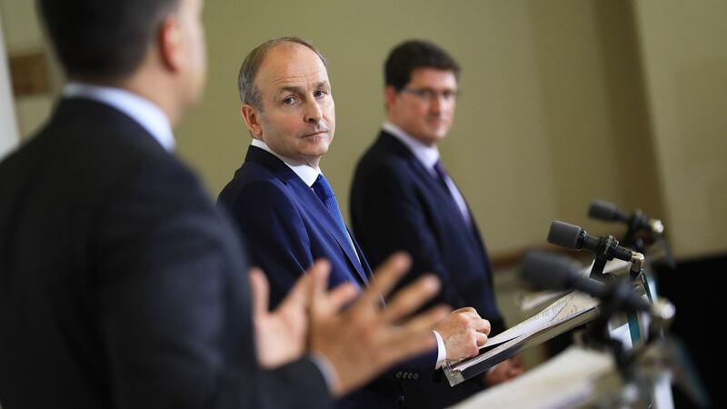 Taoiseach Micheál Martin, Tánaiste Leo Varadkar and Minister for Climate Action Eamon Ryan at Dublin Castle today for the post cabinet press briefing. Photograph: Julien Behal Photography
