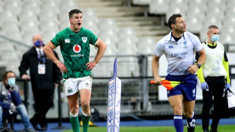 Ireland’s Jonathan Sexton encourages his team after being replaced in Paris. Photograph: Inpho