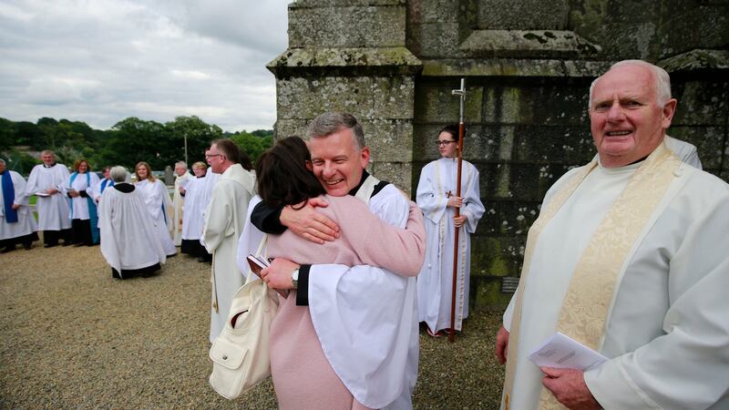 Trevor Sargent embraced by his wife Aine Neville after the ceremony at Shillelagh Parish Church, Shillelagh, County Wicklow. Photograph Nick Bradshaw
