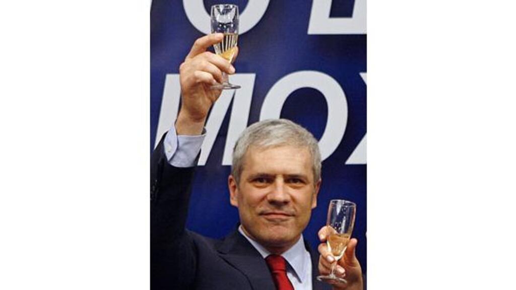 Serbia's president and leader of the Democratic Party, Boris
Tadic, toasting the election results in Belgrade yesterday.
Photograph: Ivan Milutinovic/Reuters