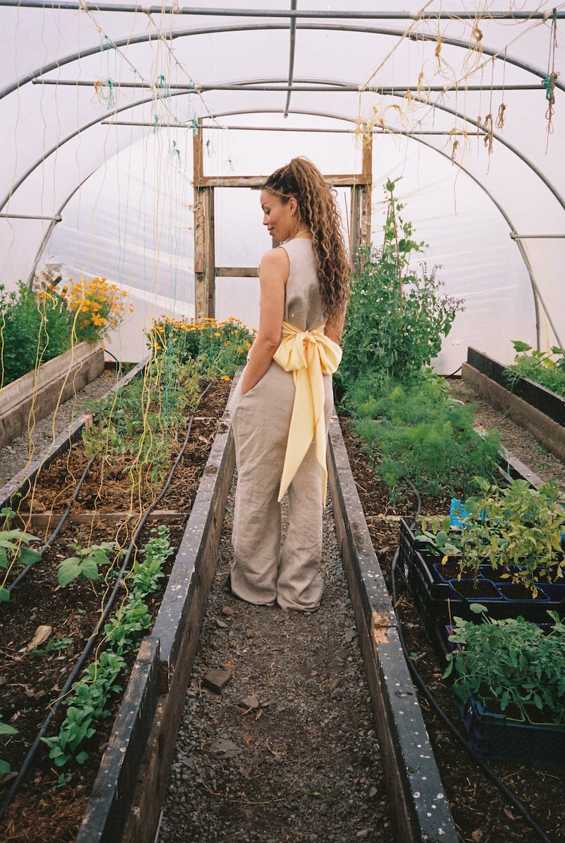 Cream wide leg trousers €245, linen waistcoat with yellow bow €195