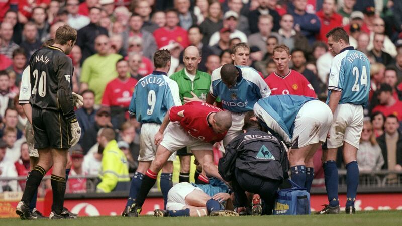 Manchester United’s Roy Keane shouts at Alf-Inge Haaland after a red card tackle that contributed to the end of the Manchester City player’s career. Photograph: Gary M Prior/Allsport/Getty Images