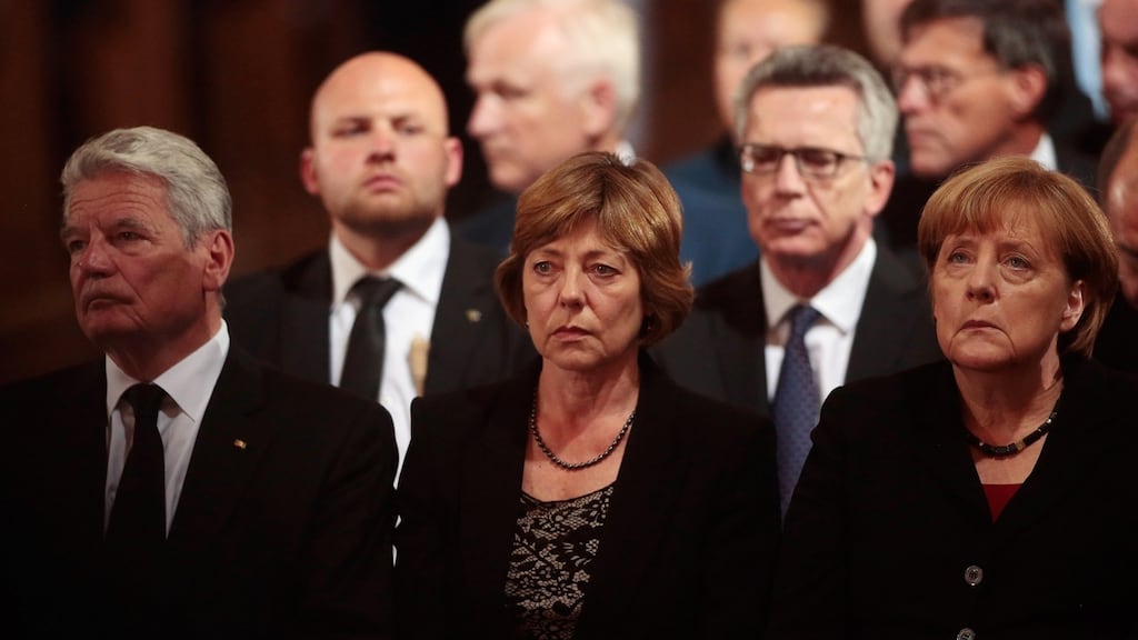 German president Joachim Gauck, his wife Daniela Schadt and Chancellor Angela Merkel attend a memorial service for the victims of last week’s shooting spree in Munich, which left nine victims dead. Photograph: Johannes Simon/Getty Images