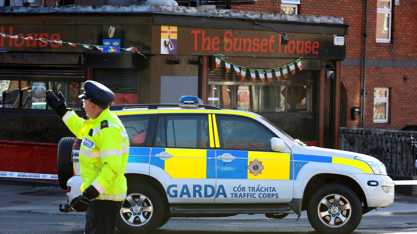 Garda outside The Sunset House pub in Dublin where a man has been shot dead in a gangland feud. Photograph: Brian Lawless/PA