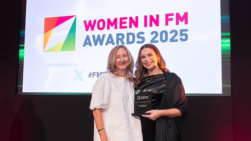 Gillian O'Connor, awards judge, presents the best environmental, health and safety leadership award to Mariane Merchiori, Mitie Facilities Management