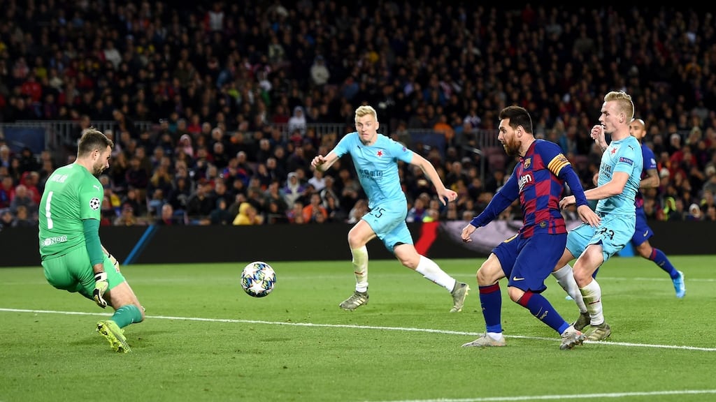 Barcelona’s Lionel Messi has a shot saved by Slavia Prague goalkeeper Ondrej Kolar during the Champions League Group F match at the Nou Camp. Photograph: Alex Caparros/Getty Images