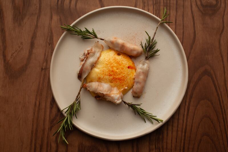 Dublin Bay prawns wrapped in lardo, on rosemary skewers with aioli