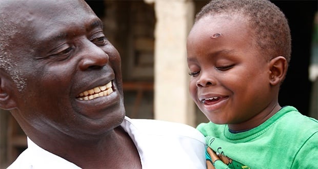 Enoch’s grandfather is delighted he can see again and look forward to a brighter future. Photo: Peter Nicholls. Copyright: Sightsavers