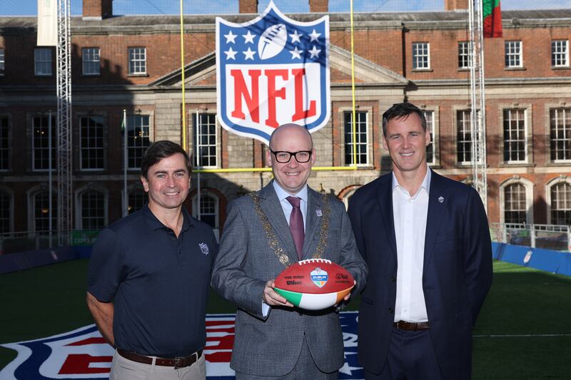 Peter O'Reilly (left) , NFL executive vice-president with Ray McAdam, Lord Mayor of Dublin, and Henry Hodgson, general manager of NFL UK and Ireland, at the NFL Experience in Dublin Castle. Photograph: Ian Walton/NFL
