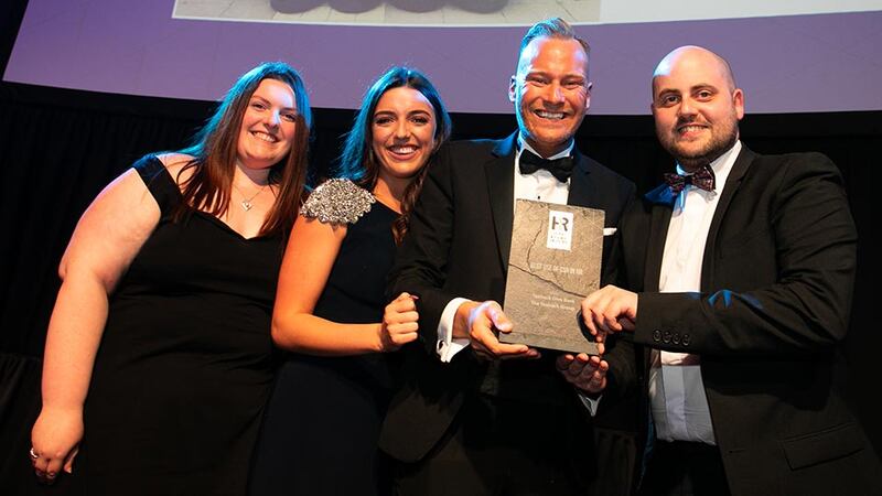 David Casey, Wellness and Health Promotion Manager, DeCare Dental, presents the Best Use of CSR in HR award to Anita Barnwell, Rachael O’Shea & Brendan Ahearne, The Taxback Group.