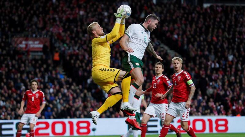 Daryl Murphy challenges Kasper Schmeichel during Ireland’s draw in Copenhagen. Photograph: Andrew Coulridge/Reuters