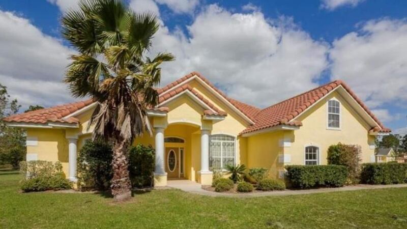 €397,500: five-bedroom home in gated Hidden Palms estates