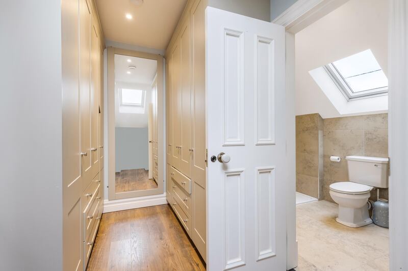 Main bedroom walk-in wardrobe and en suite