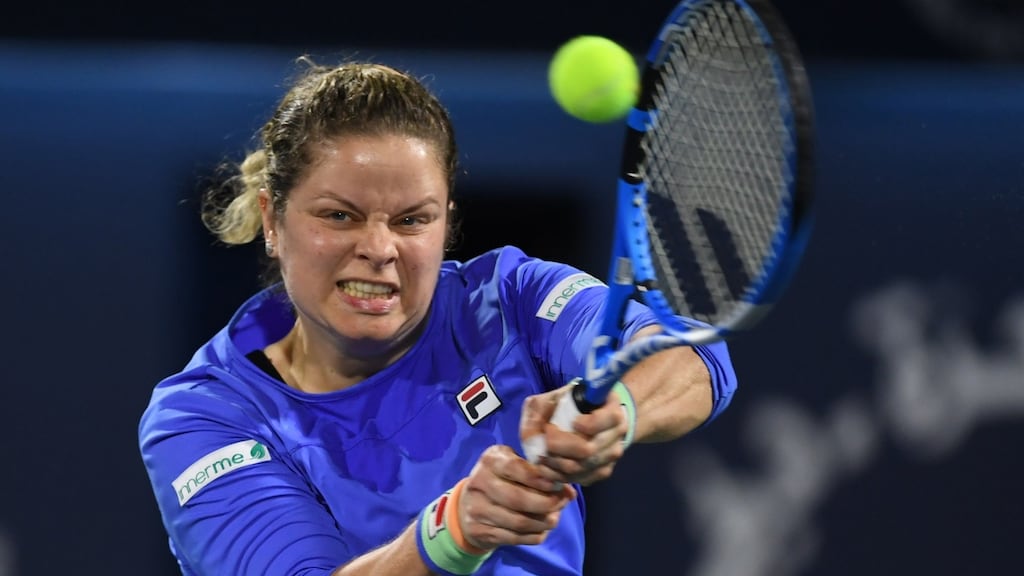 Kim Clijsters returns the ball to Garbine Muguruza during the Dubai Duty Free Tennis Championships on Monday. Photograph: Karim Sahib/AFP via Getty Images