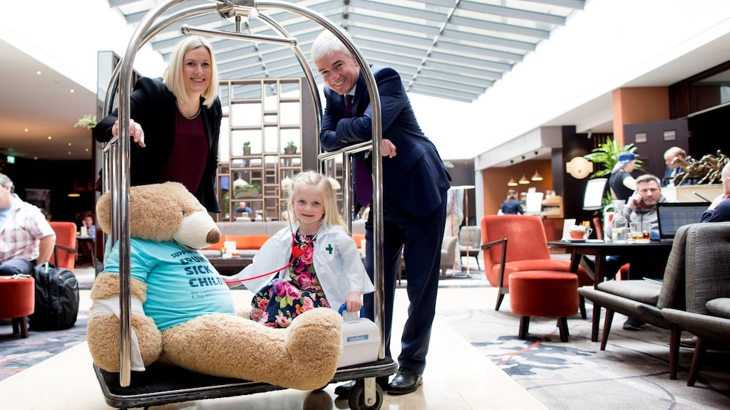 Lisa-Nicole Dunne, chief executive of CMRF Crumlin, and Dermot Crowley, deputy chief executive of Dalata, with Sophie O’Toole (5) from Swords, Co Dublin.