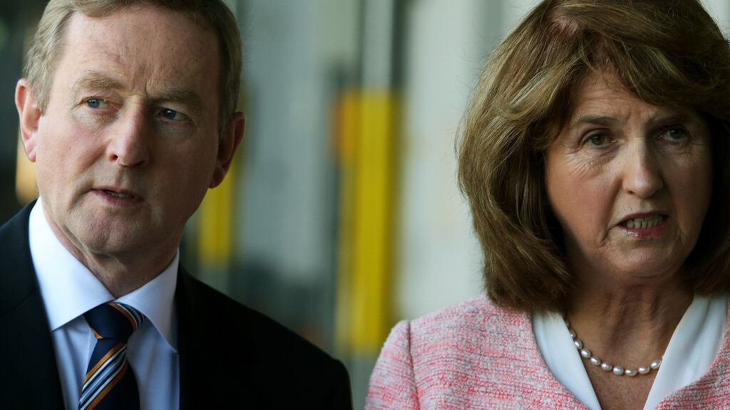 Double act: Enda Kenny and Joan Burton outlined their vision for the future funded by the capital plan. Photograph: PA