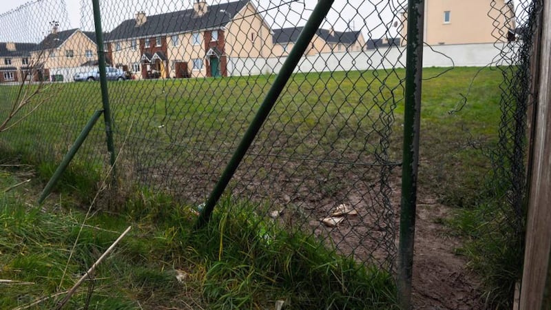 The gap in the estate fence through which James Casey Butler (7) passed before he slipped and fell into the Owencurra river at the Tir Cluain estate in Midleton, Co Cork. He died in hospital. Photograph: Daragh Mc Sweeney/Provision